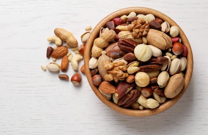 فواید و مضرات مصرف شیرینی و آجیل در ایام نوروز فواید و مضرات مصرف شیرینی و آجیل در ایام نوروز