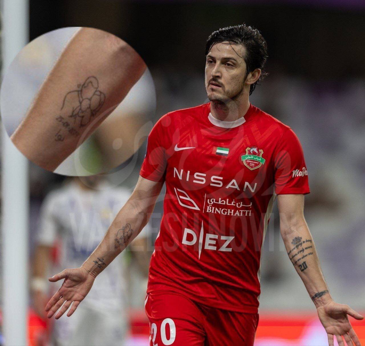 عکس/ تتوی عاشقانه سردار آزمون برای همسر و دخترش